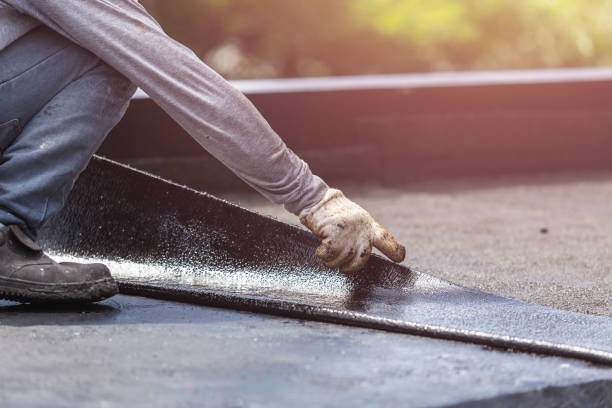 Professional Emergency Waterproofing technician working in Kentwood, MI